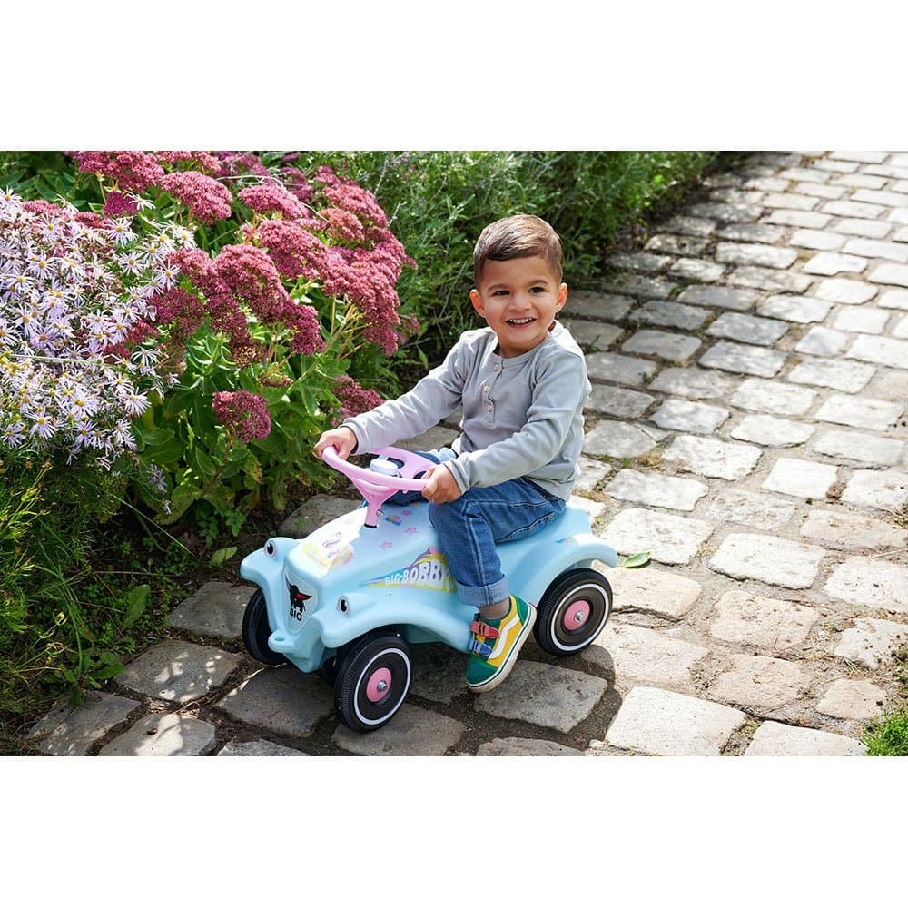 Masinuta pentru copii fara pedale Big Bobby Car Classic Unicorn, cu roti robuste,sezut ergonomic, volan cu claxon,sistem de cuplaj a unei remorci in fata si in spate, de la 1 an pana la greutate maxima admisa 50 kg