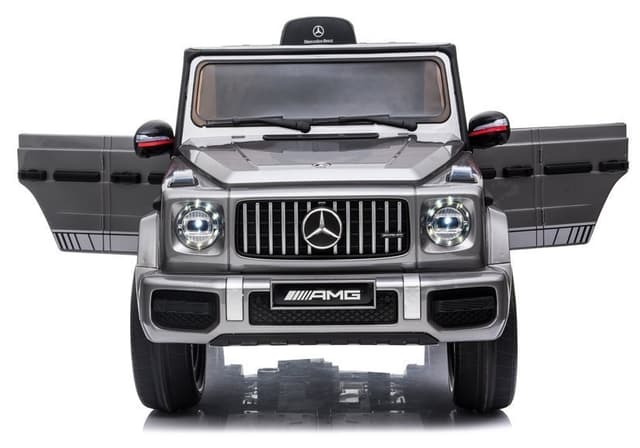 Masinuta electrica pentru copii Mercedes G63 AMG Silver Painting cu echipare Premium, scaun piele, roti Eva, telecomanda, lumini si deschidere usi