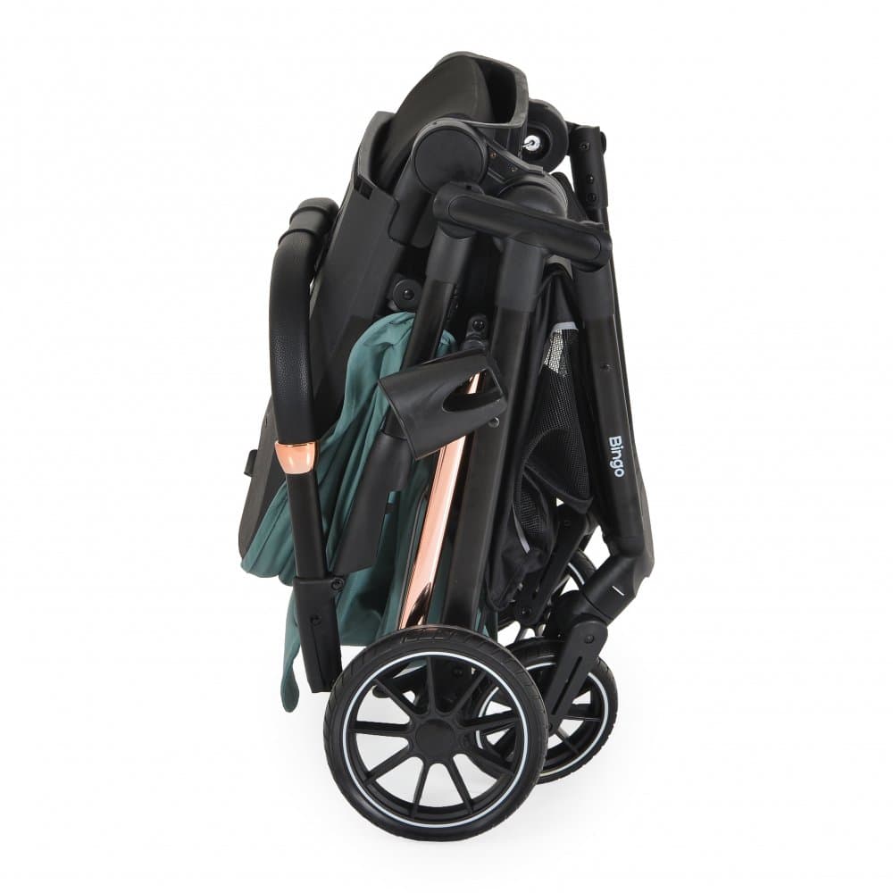 Carucior transformabil 2in1 Moni Bingo Marine Green cu sezut reversibil,pana la 4 ani sau 22kg,spatar reglabil,capotina XXL cu 4 sectiuni,pliere compacta cu unitatea scaunului, roti rezistente,husa picioare si geanta