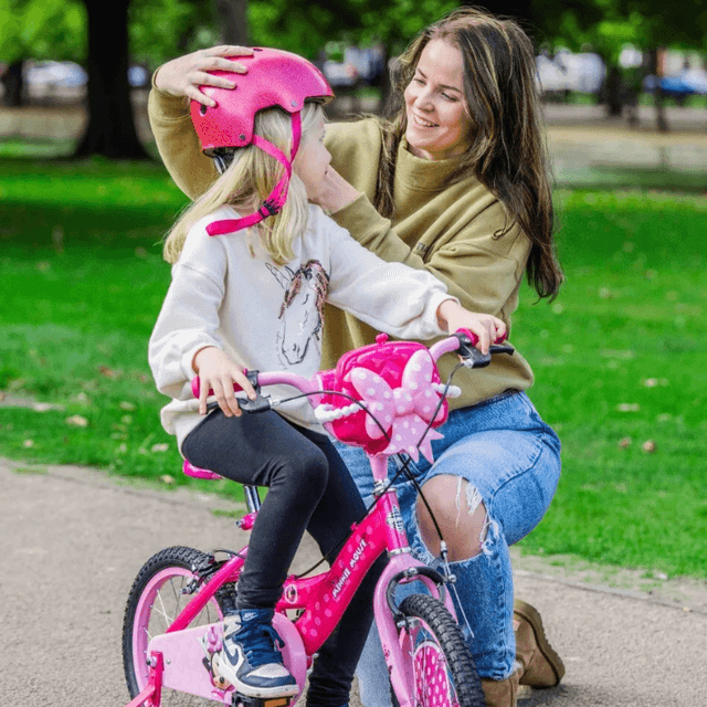 Bicicleta pentru copii Huffy Minnie 16 inch cu roti ajutatoare si gentuta