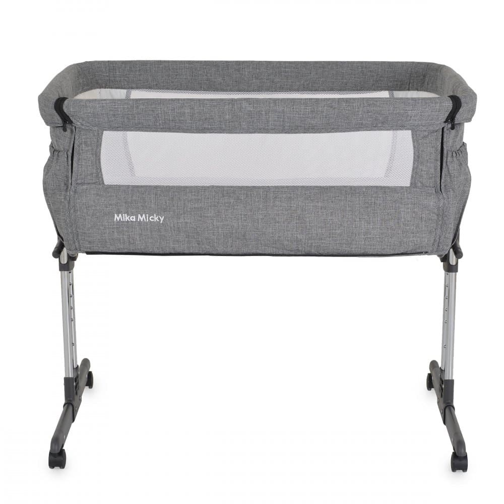 Patut co-sleeper pentru bebelusi Moni Mika Gri cu inaltime reglabila pe 7 nivele,roti cu frana,laterala detasabila,2 buzunare depozitare,laterale din plasa ventilatie,curele pentru fixare la patul parintilor,saltea inclusa